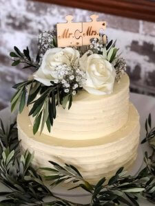 buttercream wedding cake with fresh flowers