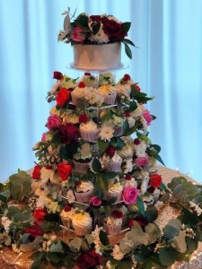 six tier stunning cupcake tower with fresh flowers