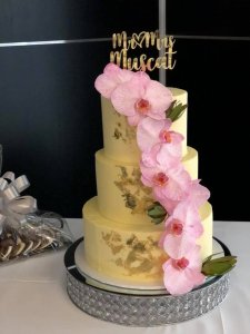 3 tier wedding cake with gold leaf