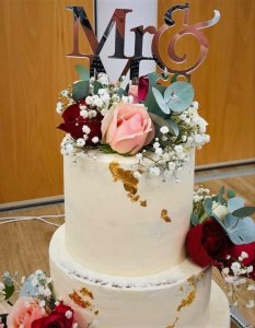 3 tier buttercream wedding cake with frsh flowers by rimma's wedding cakes perth