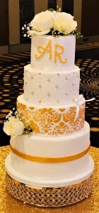 4 tier white and gold wedding cake by rimma's wedding cakes perth